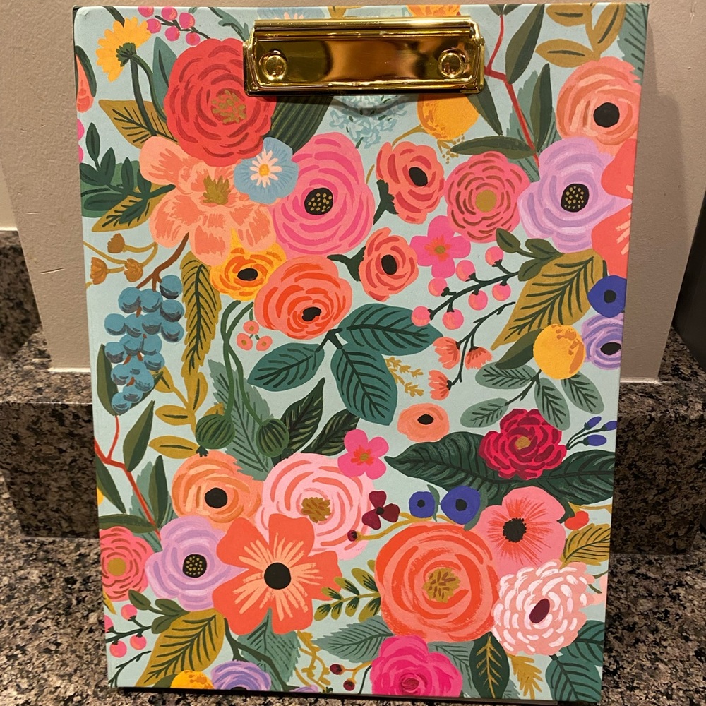 Brand new Rifle Paper Co. clipfolio. Never used.